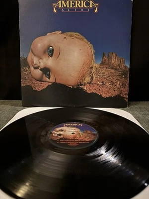 America - Alibi - Capitol Records Pressing SOO-12098 - Image 1 of 4