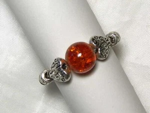 ANELLO ELASTICO CYNTHIA LYNN "DUE CUORI" ROSSO VETRO CREPITATO PERLINE ARGENTO CUORE - Foto 1 di 1