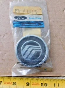 NOS WIRE WHEEL COVER ORNAMENT 1988-89 MERCURY FULL-SIZE CARS +COUGAR TOPAZ - Picture 1 of 2