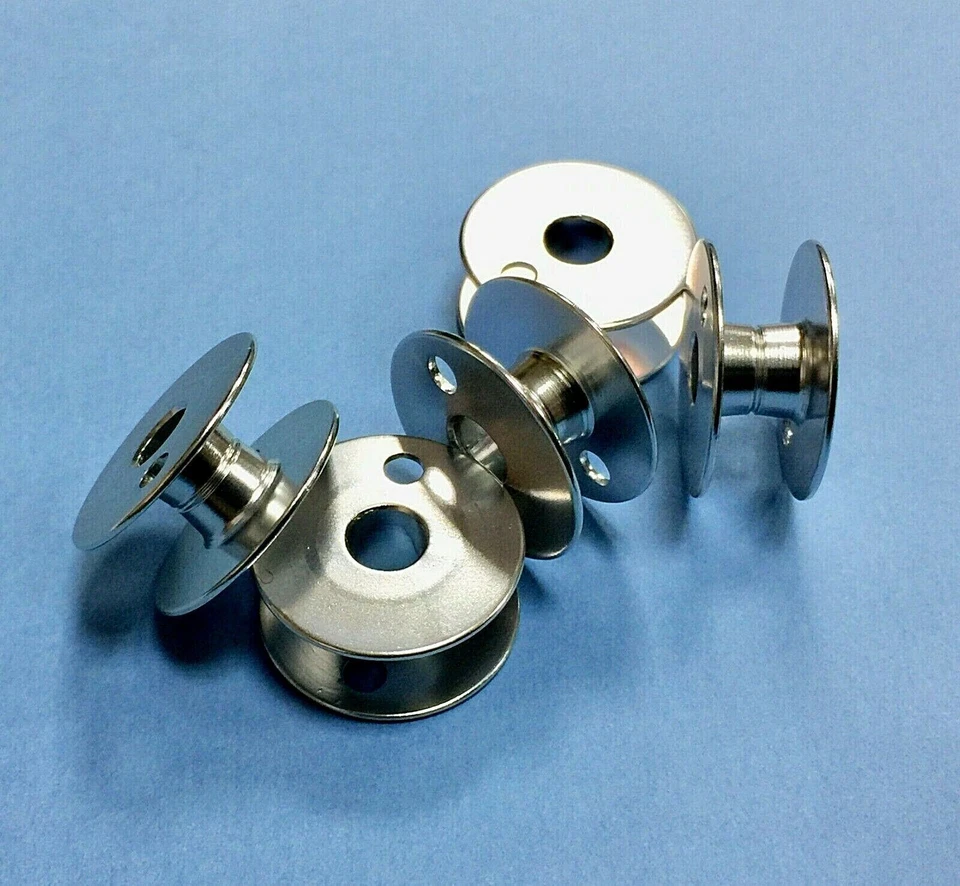 5X   Bobbin with 1 Hole  (Alum.) 22mm  #244750 f/Singer 211GX, 211U, 212U, 212W - Image 1 of 1