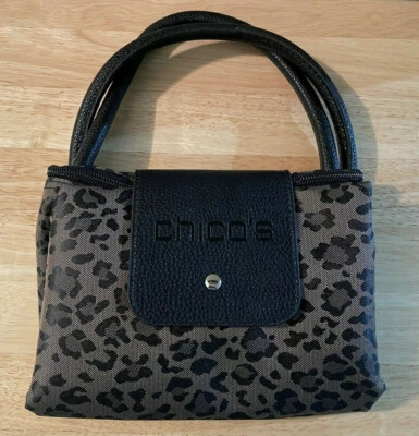 CHICO'S LEO ROLL PEQUEÑO MINI BOLSO DE MANO DE VIAJE ESTAMPADO DE LEOPARDO PLEGABLE NUEVO CON ETIQUETAS Foto 1 de 4