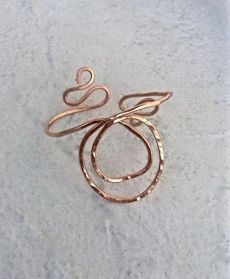 Puño de muñeca Lotus Foto 1 de 2