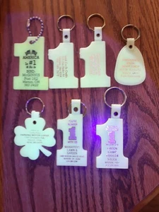 Lotto di 7 portachiavi pubblicitari vintage Glow in the dark - Foto 1 di 8