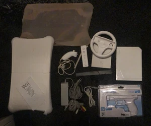 Nintendo Wii Konsole + viel Zubehör + 12 Spiele + Wii Fit Board + 2 Controller - Bild 1 von 3