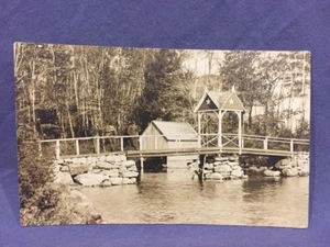 Bridge on stacked rocks over river real photo postcard - Picture 1 of 3