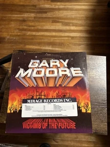 Gary Moore: Victims Of The Future 1984 Mirage 90154-1 Timing Strip Gold Promo LP - Picture 1 of 6