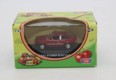 Motor Max 1:87 Scale Fresh Cherries 91 Ford Escort NIB Metallic Red - Image 1 of 2
