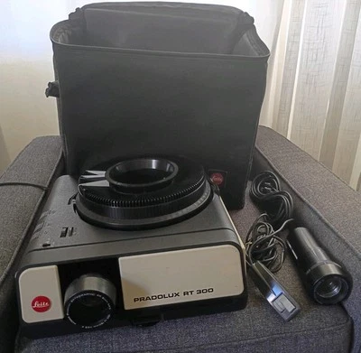 Leitz Pradolux RT 300 35mm Slide Projector w/ Case, Remote, Carousel, Lenses - Image 1 of 4