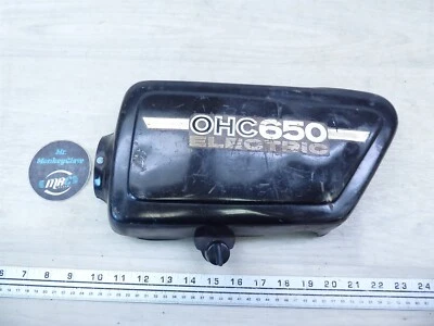 Yamaha XS650 Y920 1975) panel de cubierta lateral izquierdo negro con perilla Foto 1 de 4