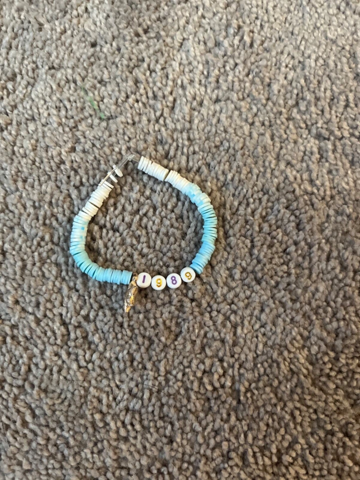 1989 Taylor Swift friendship bracelet blue and white with gold starfish - Image 1 of 1