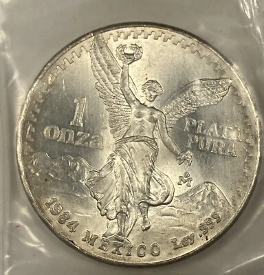 1984 Mexican  Onza Libertad. 1oz Silver. Choice BU. Sealed - Image 1 of 3