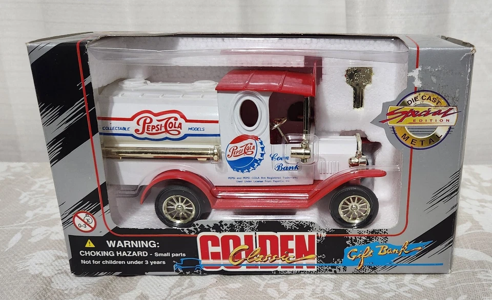 Banco de monedas de oro fundido a presión vintage Pepsi blanco y rojo  Foto 1 de 4
