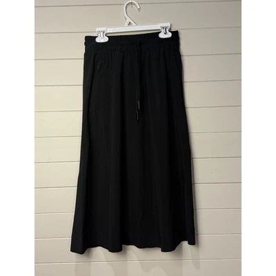 Athleta 黑色中裙弹性腰抽绳口袋 0 码运动休闲 — 第 1/4 张图片
