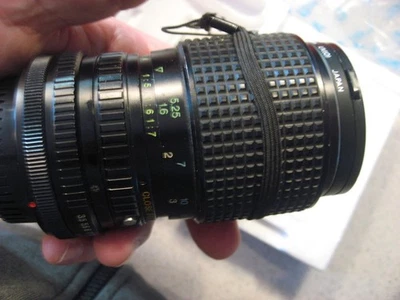 Tokina SMZ 105 35mm - 105mm 1:3.5-4.3 w/Nova 55mm UV (O) Filter & Caps for Canon - Image 1 of 4