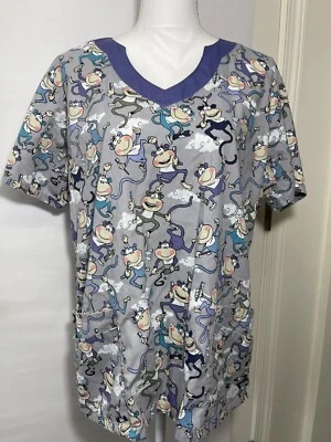 Blusa Médica UA SCRUBS Monkeys Pasta de Dientes Hilo Mujer Talla Grande Gris Púrpura En muy buena condición Foto 1 de 4