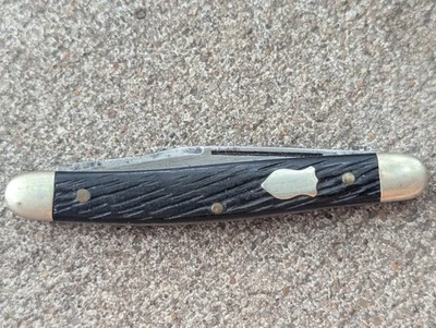 Navaja de Bolsillo Schrade USA 708 "Serpentine Jack" De Colección Mango Negro Escudo  Foto 1 de 4