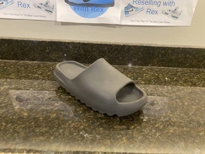 Size 12 - adidas Yeezy Slide Dark Onyx - Picture 1 of 8