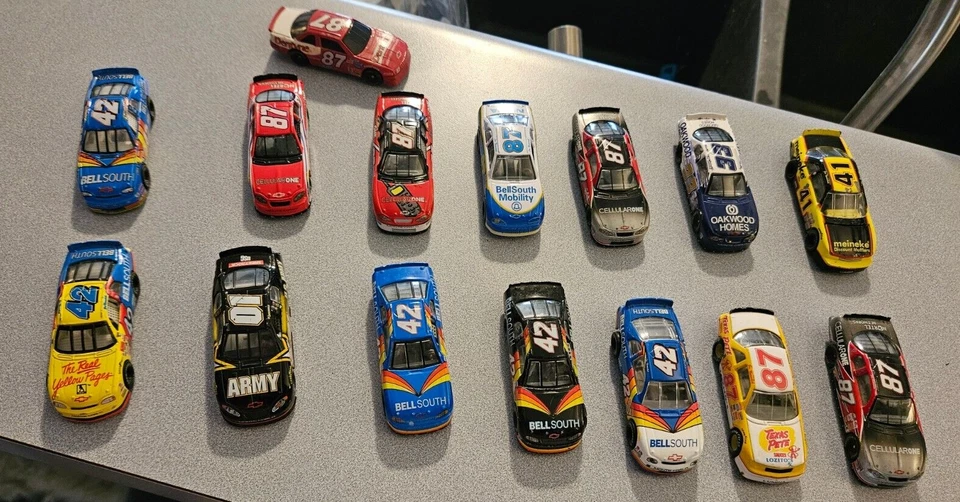 Lot of 15 Joe Nemechek 1/64 Diecast Nascars Action Lionel - Image 1 of 4