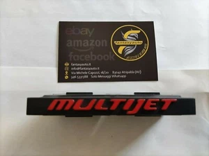 Fiat Grande Punto Dal 2005 > Fregio Sigla Scritta Multijet Colore Rosso 43312 - Foto 1 di 4