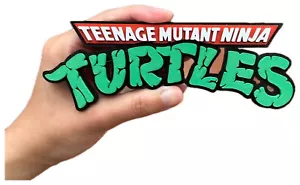 Decorative TMNT Teenage Mutant Ninja Turtles logo Sign Display Small 16cm X 6cm - Picture 1 of 5