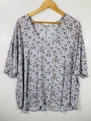 Camisa para mujer By Together pequeña azul geométrica manga dolman cuello en V ligera  Foto 1 de 4