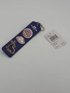 SET SPILLE COACH VARSITY CLASSIC EMOJI, LABBRA, CONIGLIO, SEGNALIBRO E PORTACHIAVI - NUOVE CON ETICHETTE - Foto 1 di 4