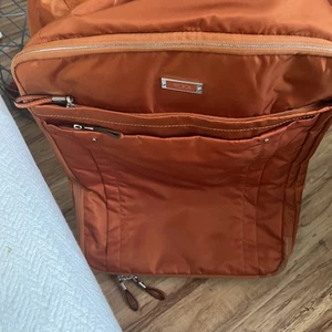 TUMI Wheeled Duffle Bag ORANGE Rolling Bag Carryon Weekend 22” - Picture 1 of 10