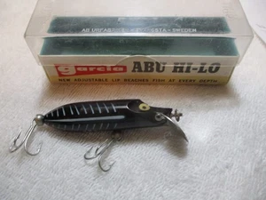 Señuelo de pesca vintage Garcia Abu Hi-Lo Suecia con original Esqueleto blanco y negro - Imagen 1 de 2