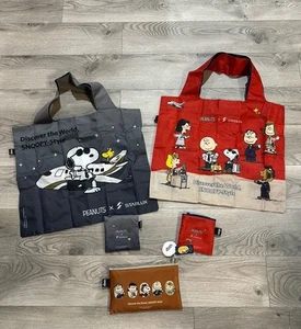 Snoopy m528 Starlux Airlines Peanuts Snoopy Discover The World Travel Bags NEW - Picture 1 of 6