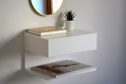 White floating nightstand with drawer and an extra shelf