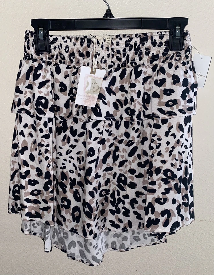 Falda Jessica Simpson para niñas nueva con etiquetas talla 12 estampado de leopardo Foto 1 de 3