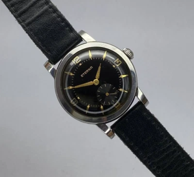 VINTAGE ETERNA MANUAL WIND MOVEMENT GILT DIAL MIRROR FINISH STAINLESS STEEL 33MM - Image 1 of 4