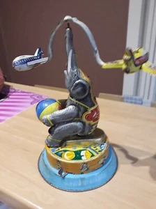 éléphant qui fait tourner les avions + boite - Photo 1/4