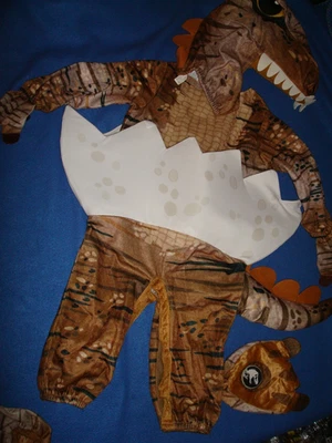 Jurassic World T-Rex Infantil Cálido Mono - Bebé Dinosaurio en Huevo Disfraz 12-24 M Foto 1 de 4