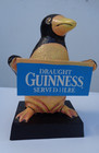 Draught 6 1/2" GUINNESS SOLD HERE Advertising Sign held by a Penquin