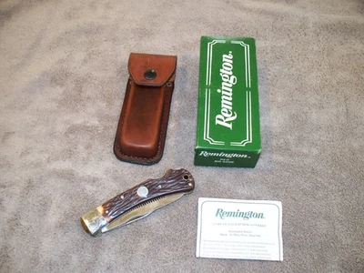 CUCHILLO DE CAZA REMINGTON R3-D BIG GAME DOS HOJAS BLOQUEO TRASERO CON FUNDA NOS Foto 1 de 4