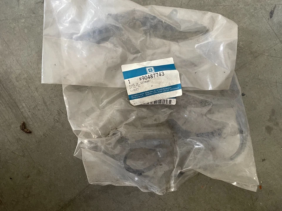 Sello izquierdo faro GM genuino para Cadillac Catera 90487743 Foto 1 de 1