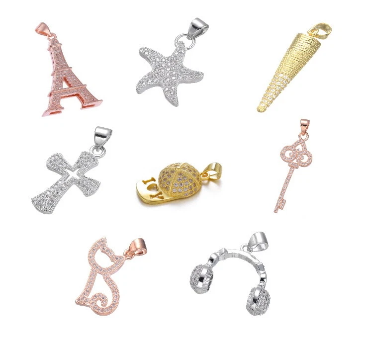 Anhänger Kette Eiffelturm Kopfhörer DJ Seestern Kreuz Baseball Cap Katze Kegel - Bild 1 von 1