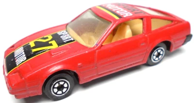 VINTAGE YATMING SPORT MOTOR #27 RED 1:64 DIECAST 2 3/4" CAR W/ BLACK & YELLOW - Image 1 of 4