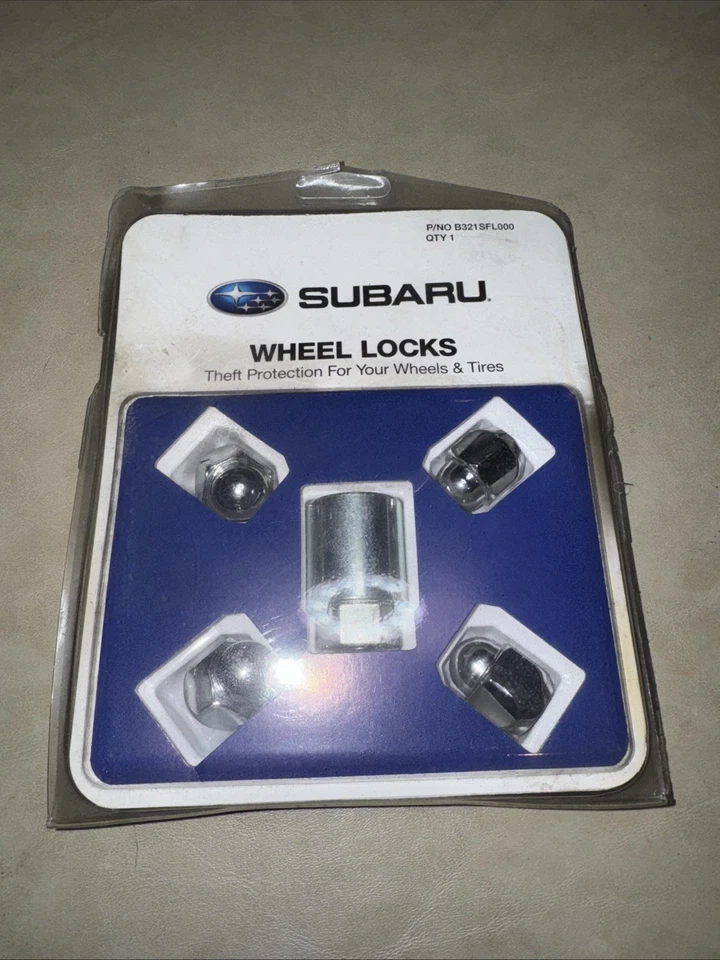 Juego de tuercas de bloqueo de rueda de aleación Subaru 2009-2025 OEM B321SFL001 genuino todos los modelos Foto 1 de 2