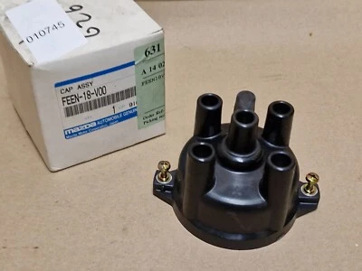 Tappo Distributore Mazda Serie E 626 323 FEEN18V00 FEEN-18-V00 Originale NUOVO - Immagine 1 di 4