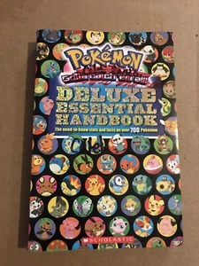Pokemon Paperback Book Deluxe Essential Handbook Over 700 Pokemon Stats - Imagen 1 de 3