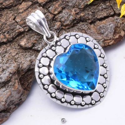 Atractivo colgante hecho a mano de plata de ley 925 con piedras preciosas de topacio azul suizo H3-29 Foto 1 de 3
