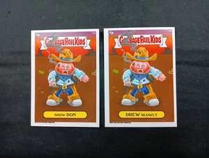 2014 Garbage Pail Kids Serie 1 #14a&b Lotto di 2 Show Don, Drew Slowly - Foto 1 di 5