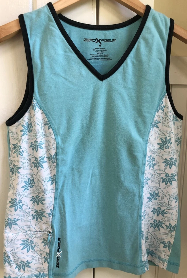 Camiseta sin mangas ZeroXposur para mujer con cuello en V, estilo alto, mediana, aqua y blanca con flores Foto 1 de 4