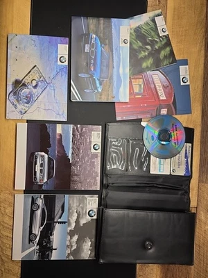 BMW E46 2004 serie 3 convertible 325Ci 330Ci manuales del propietario con estuche y CD Foto 1 de 4