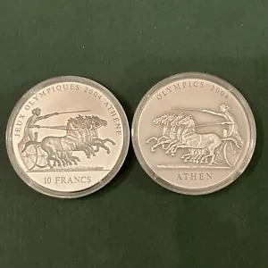 2 Coin Set 2001 Ghana 500 Sika & 2001 Congo 10 Francs 2004 Athens Olympics Horse - Picture 1 of 11