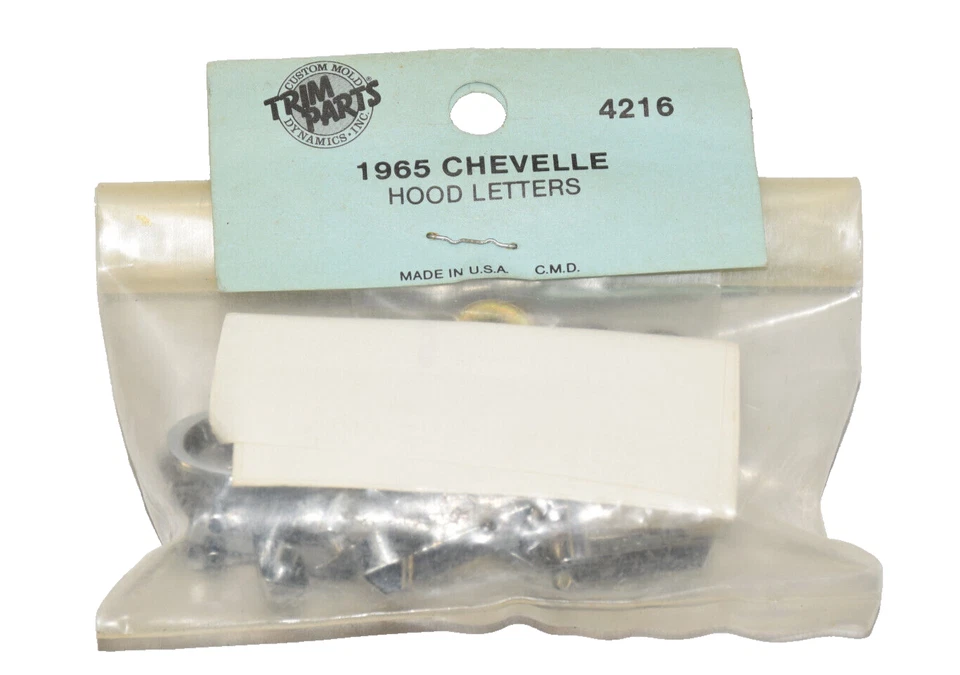 "Chevelle" 1965 nuevo capó emblema letras molduras piezas # 4216 - EE. UU. Foto 1 de 4