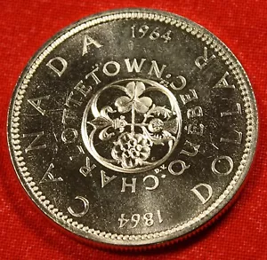 Moneda de dólar canadiense 1964 UNC 80 % plata CAD16 - Imagen 1 de 2