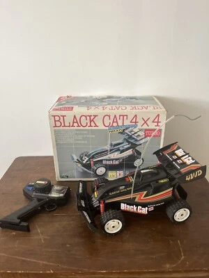 Vintage Black Cat 4X4  Nikko Rollet Radio-guidé Complet Fonctionnel 80’s - Photo 1/4